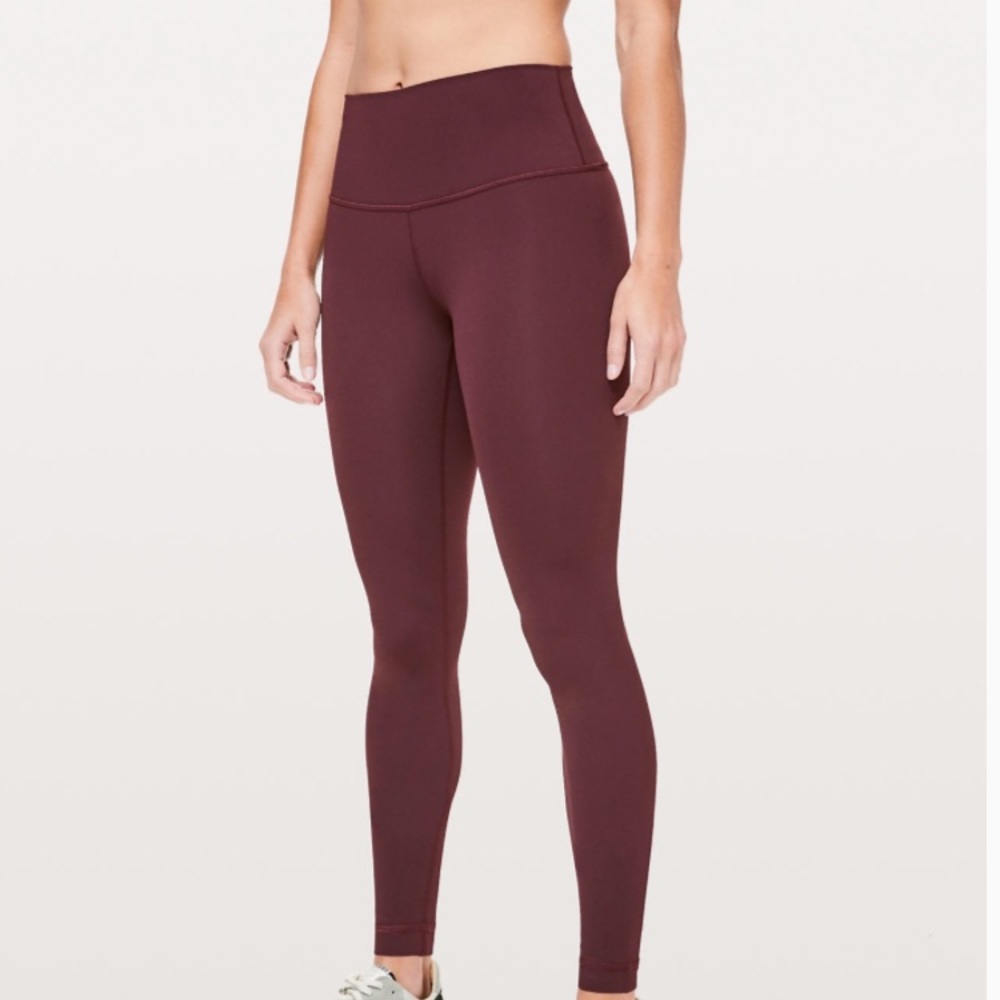 Purple Lululemon high wasted leggings.